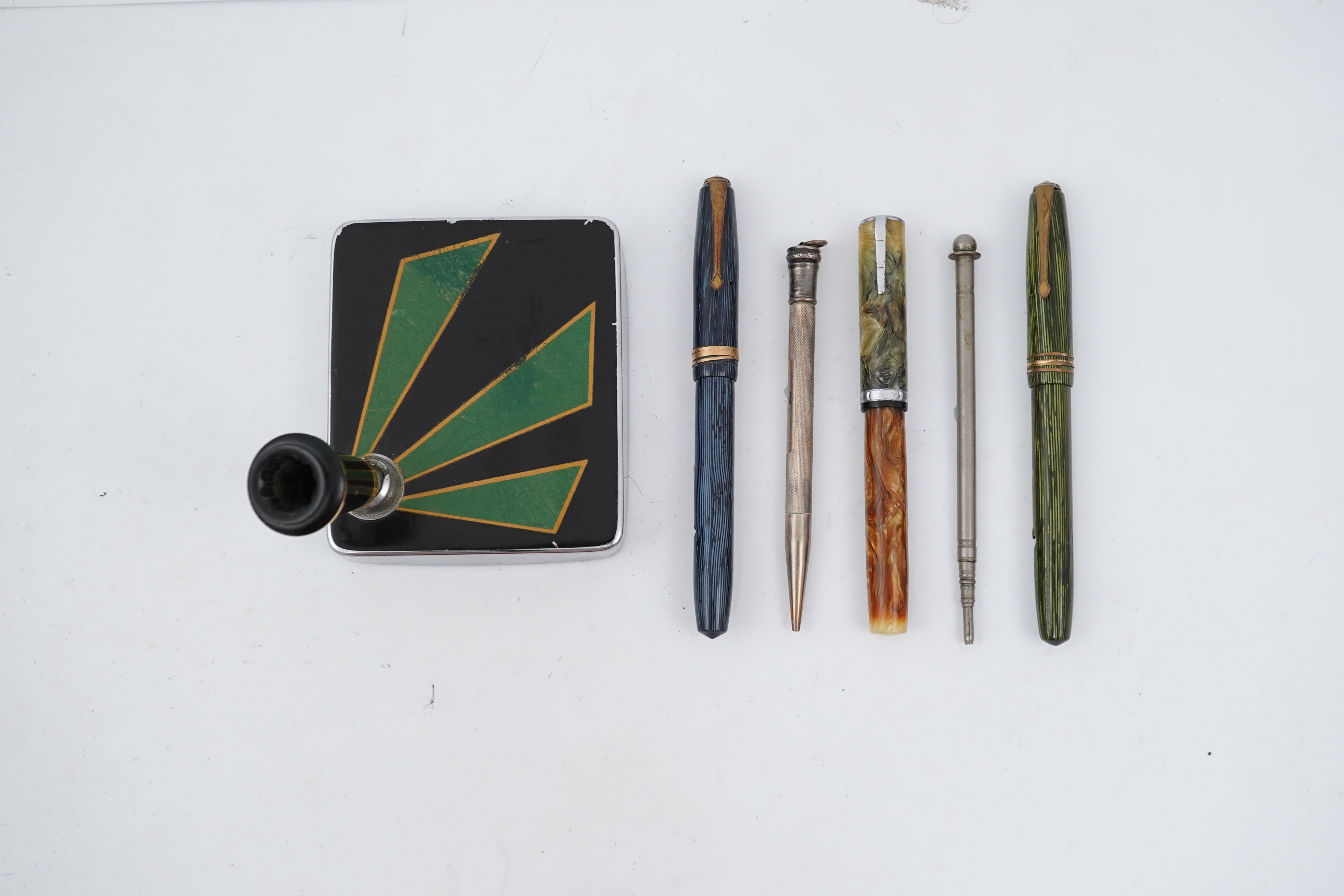 A Parker 'Art Deco' desk/pen base plus Waterman Lady Patricia and Conway Stewart Pens, etc.